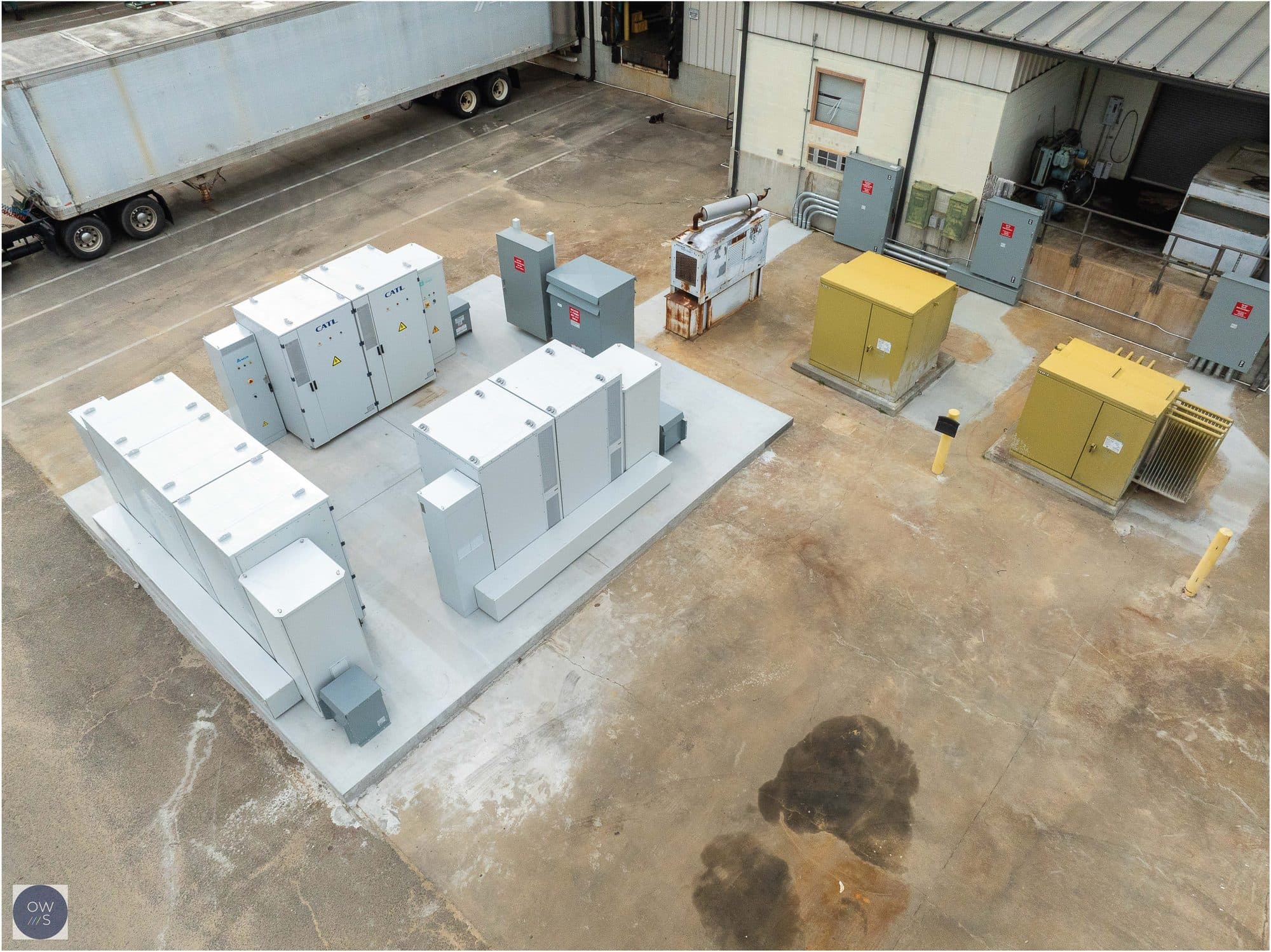 Aerial view of OneWorld Solar BatteryCube battery storage cabinets and utility transformers at the Samsonite and TUMI facility in Vidalia, Georgia