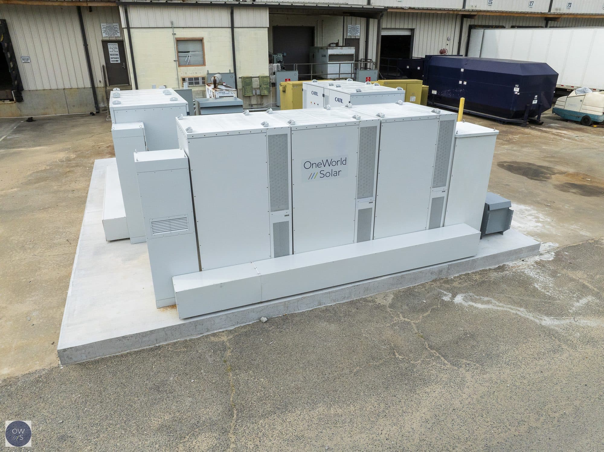 OneWorld Solar BatteryCube cabinets on a concrete pad at a commercial facility in Vidalia, Georgia